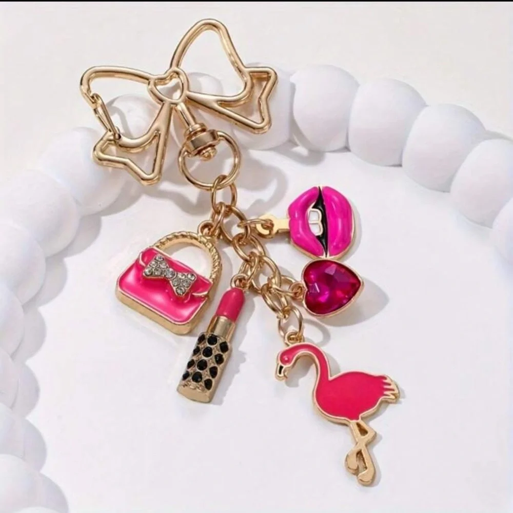 ✨ NWOT Pink & Gold Bow Bag Charm ✨